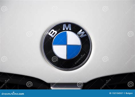 Closeup of BMW Brand Logo. Chrome Car Emblem Sign on the White Car Hood ...