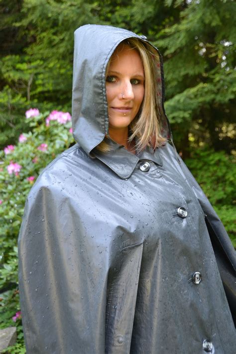 Well protected in her Klepper rubber cape | Rainwear girl, Rain fashion ...