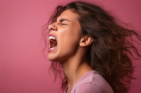 Premium AI Image | a woman screaming with her mouth open on a pink ...