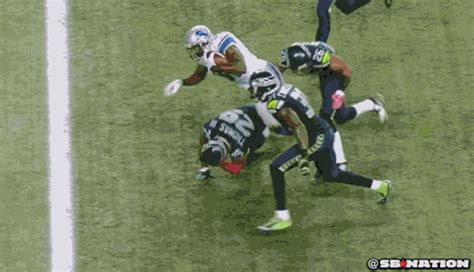 Kam Chancellor swipes ball out Calvin Johnson’s hands to preserve ...