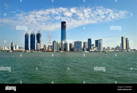 Growing Xiamen city waterfront skyline by East China sea Stock Photo - Alamy