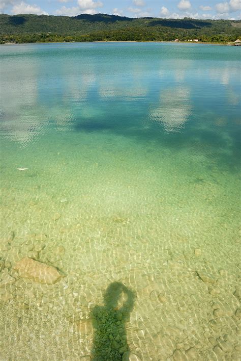 Peten Itza lake reflection Photograph by Byron Ortiz