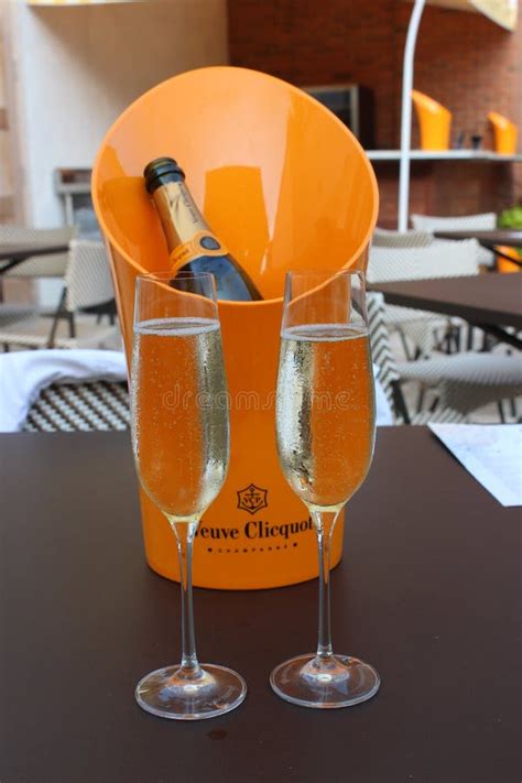 Two Champagne Flutes Filled with Veuve Clicquot, Blue Hen Beer & Wine ...