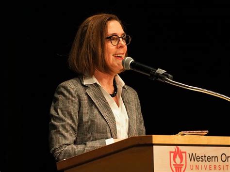 Oregon Governor Kate Brown speaks at a fundraising dinner organized by ...