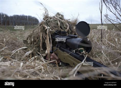 British Army Infantry soldiers demonstrate their newest L115A3 sniper ...