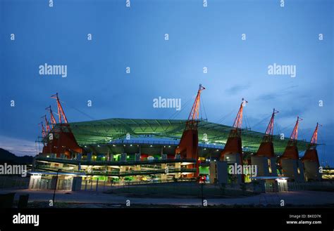 Mbombela stadium at night showing the giraffe-like structures holding ...