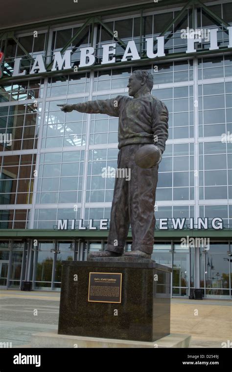 Statue of Curly Lambeau founder of professional football team Green Bay ...