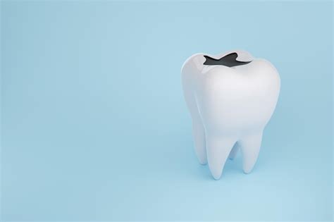 Premium Photo | Decayed tooth on blue background