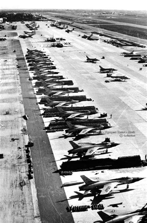 an old black and white photo of airplanes parked on the tarmac at an ...