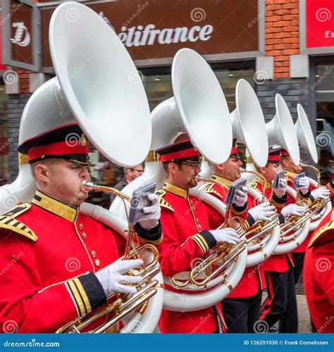 Five Sousaphone Blazers in Beautiful Red Uniforms Lined Up Marching in ...