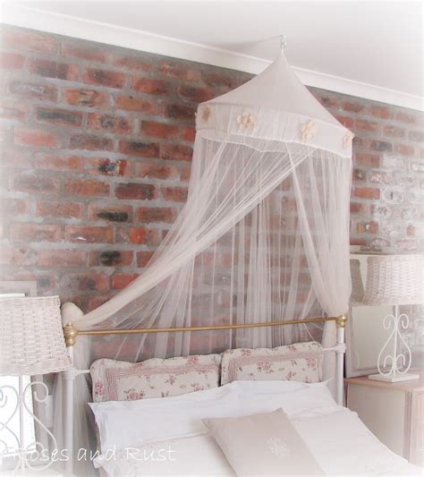 Roses and Rust: Exposed brick in the bedroom