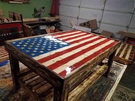 American flag wood coffee table. Epoxy clear finish. The wood is Pine torched to bring out wood ...