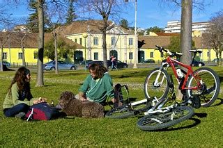 A couple, a dog an two bicycles | Belem, Lisbon, Portugal | Flickr