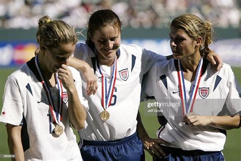 Midfielder Kristine Lilly, defender Brandi Chastain, and forward Mia ...