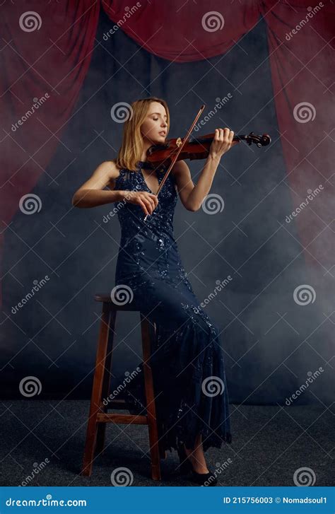 Female Violonist with Bow and Violin, Solo Concert Stock Image - Image of light, live: 215756003