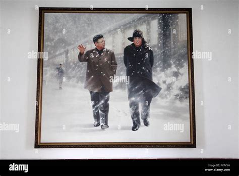 Painting of Kim Il Sung and Kim Jong Il on display at the Mansudae Art Studio Stock Photo - Alamy