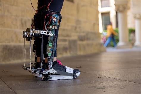 A robotic exoskeleton adapts to wearers to help them walk faster | MIT ...