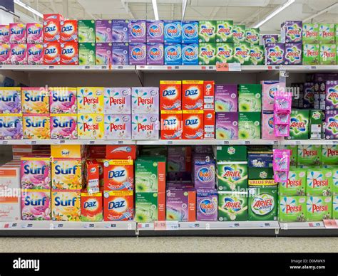Boxes of washing powder on sale in a UK supermarket Stock Photo - Alamy