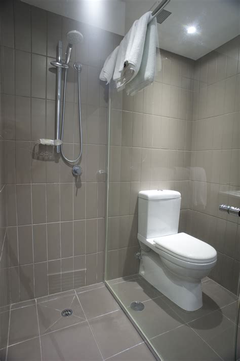 Free Image of Toilet and shower in a small bathroom | Freebie.Photography