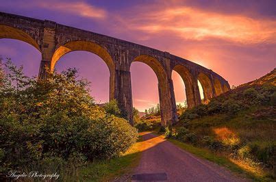 Glenfinnan Viaduct at sunset | Cool places to visit, Places to visit, Scotland castles