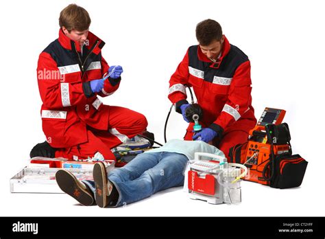 Fire service paramedics, with emergency equipment Stock Photo - Alamy