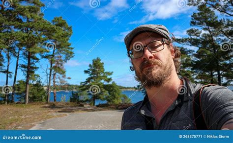 A Man Wearing Glasses Posing for the Camera Stock Image - Image of ...