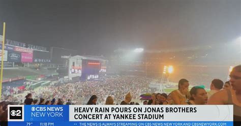 Heavy rain pours on Jonas Brothers concert at Yankee Stadium - CBS New York