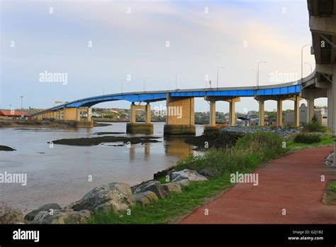 Bridge on the Bay of Fundy in Saint John New Brunswick, Canada at sunset Stock Photo - Alamy