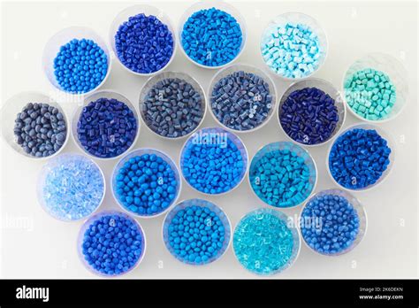 different blue plastic resin granulates for injection moulding process in different granulate ...