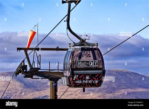 Fort William Aonach Mor Mountain Nevis Range a single gondola arriving near the top of the lift ...