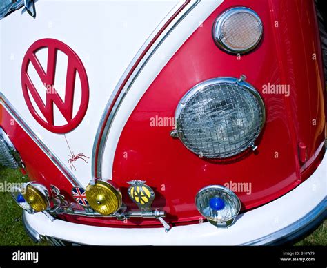 red vw volkswagen split screen bus camper van Stock Photo - Alamy