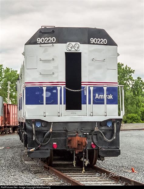 The rear end of an NPCU in fresh Phase IV... AMTK 90220 Amtrak NPCU at Albany-Rensselaer, New ...