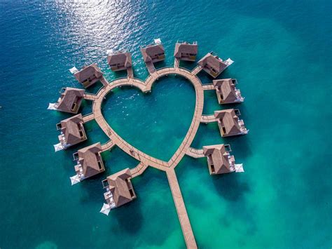 Sandals Resorts’ Over-The-Water Bungalows Are The Ultimate Luxury