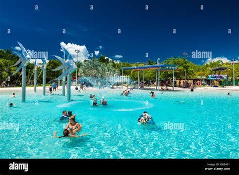 CAIRNS, AUSTRALIA - 27 MARCH 2016. Tropical swimming lagoon on the Esplanade in Cairns with ...