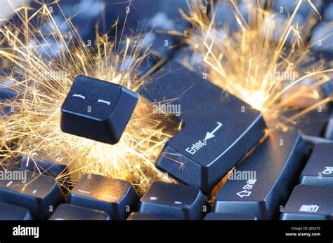 keyboard PC computers computer key explosion burst sparks danger keyboard PC Stock Photo - Alamy