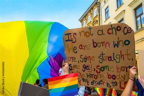 Pride parade with lots of flags and posters in support of LGBTQ+ Stock ...