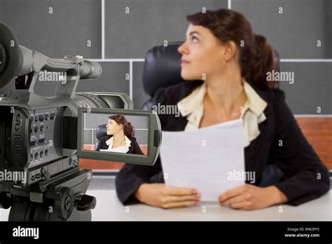 camera view of a female reporter in a news room Stock Photo - Alamy