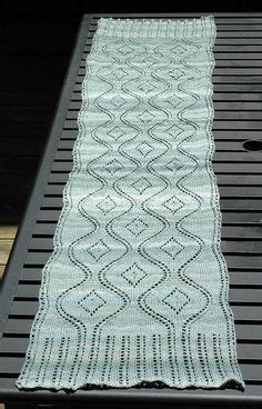 Seascape is a featherweight wrap with sinuous lines of shifting yarn ...