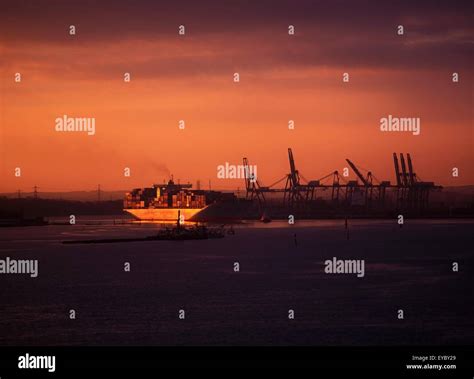 Shipping, Container Ship At Sunset Stock Photo - Alamy