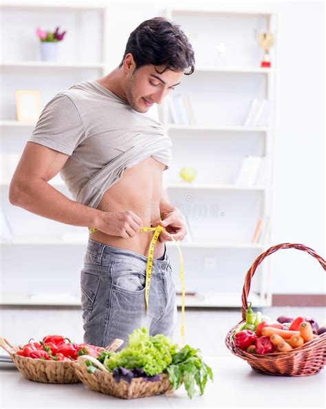 Young Man in Healthy Eating and Dieting Concept Stock Photo - Image of ...