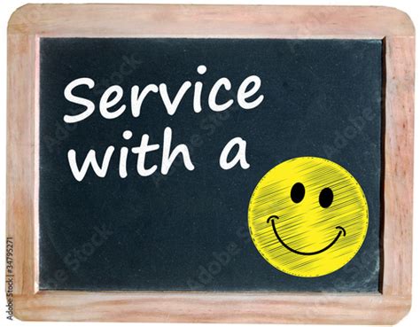 ""SERVICE WITH A SMILE" on blackboard (customer care)" Stock photo and ...