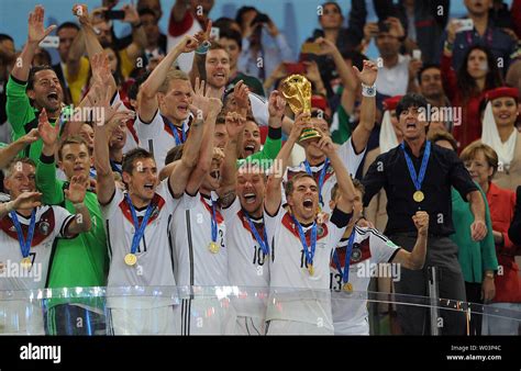 Philipp Lahm of Germany lifts the trophy following the 2014 FIFA World Cup Final at the Estadio ...