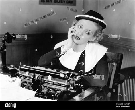 BETTE DAVIS at Typewriter in FRONT PAGE WOMAN 1935 director MICHAEL CURTIZ costume design Orry ...