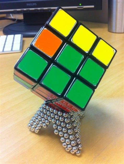 Rubik's Cube Stand via Dotpedia.com | Rubiks cube, Cube, Creation