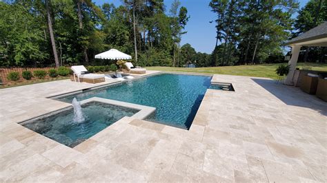 Inground Swimming Pool with flush spa. Ivory Travertine Deck and Coping ...