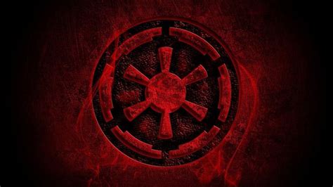 a red and black wallpaper with a star wars symbol on it's side