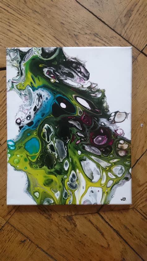 This canvas was uneven and the pour moved A LOT to one side before I ...