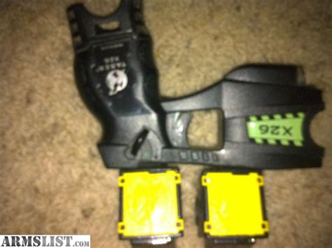 ARMSLIST - For Sale: Taser X26 plus 2 cartridges ( yellow door )