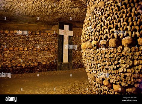 In the Catacombs of Paris, a huge ossuary in some abandoned mines in Montparnasse, Paris, France ...