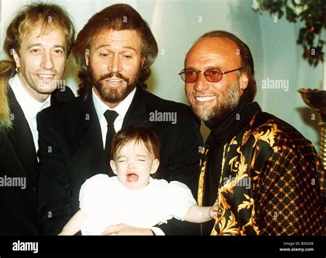 Bee Gees pop group Maurice Gibb Robin Gibb and Barry Gibb with his Stock Photo: 20285952 - Alamy